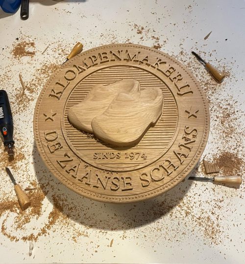 Exclusive oak wood carving commissioned for a luxury stadium interior